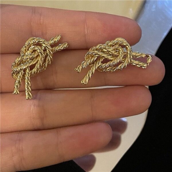 Chunky metal knot earring